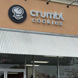 crumbl cookies storefront with open sign