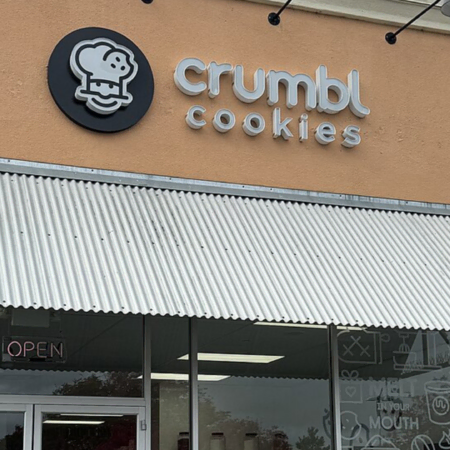 crumbl cookies storefront with open sign