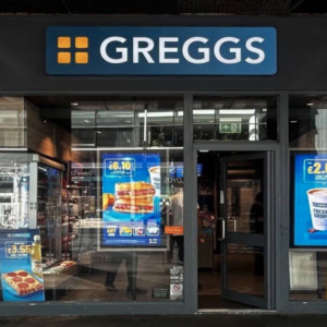 greggs bakery shopfront with blue sign and offers
