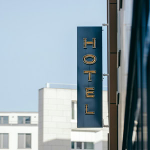 modern hotel sign on urban street
