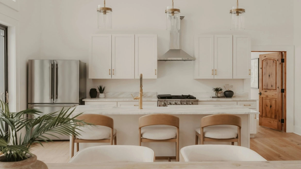 bright modern kitchen with marble island