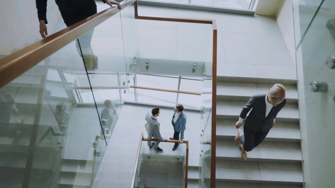 modern office staircase with glass railings