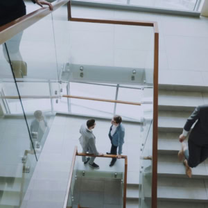 modern office staircase with glass railings