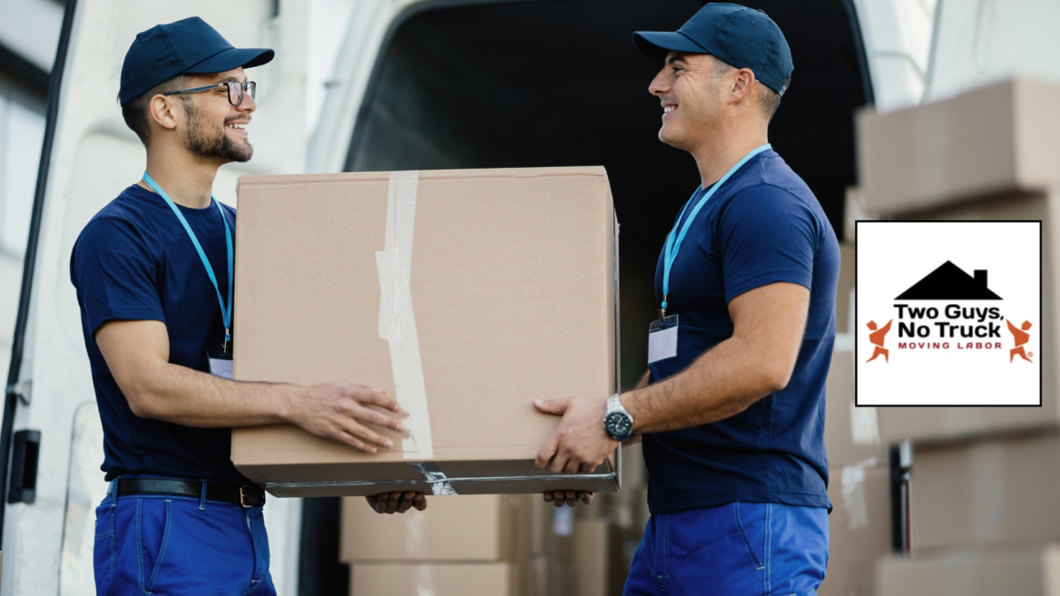 professional movers carrying box by truck