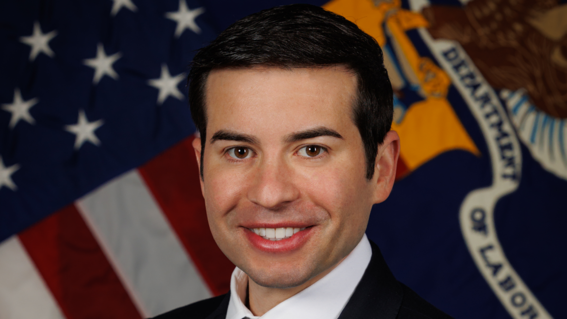 official governor portrait with flag and seal