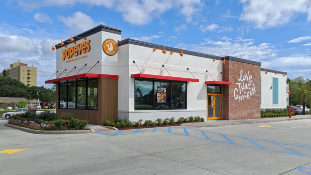 restaurant popeyes moderne avec drive thru et parking