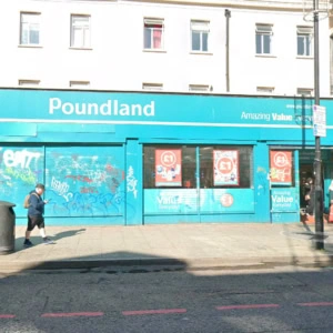 poundland storefront on sunny town street