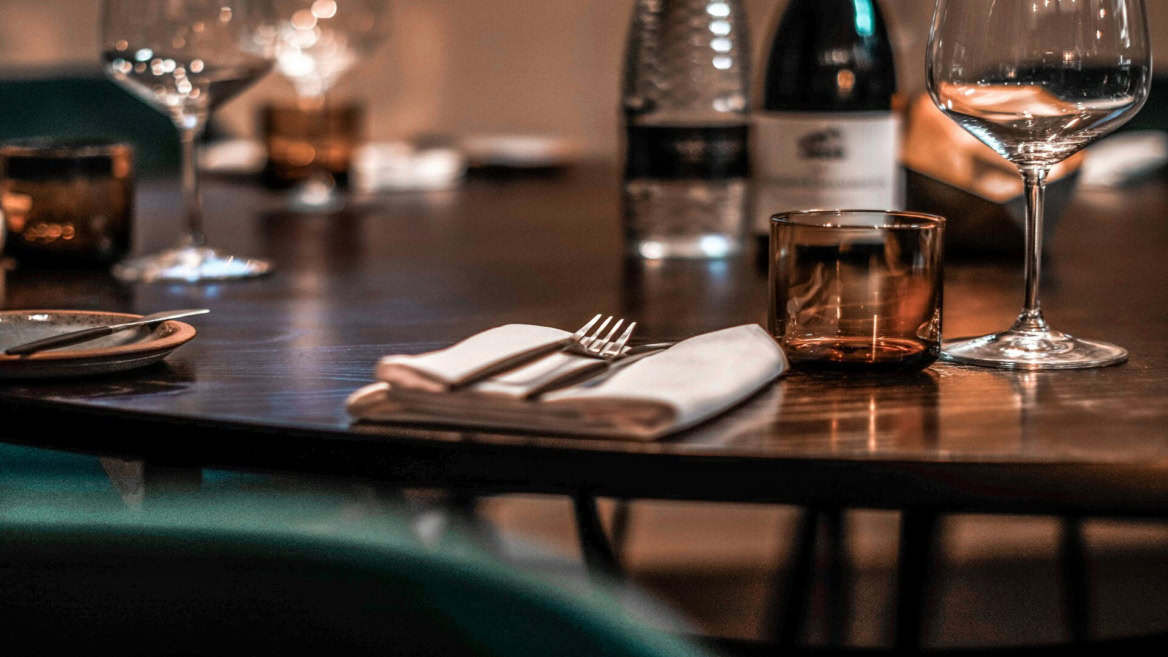 elegant wine table setting in warm light