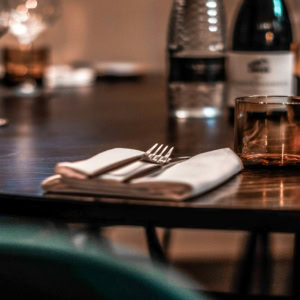 elegant wine table setting in warm light
