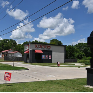 scooter’s coffee drive thru under blue sky