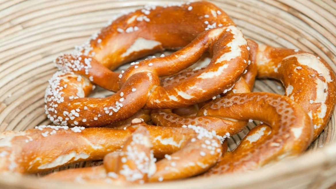 golden soft pretzels in woven basket