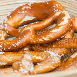 golden soft pretzels in woven basket