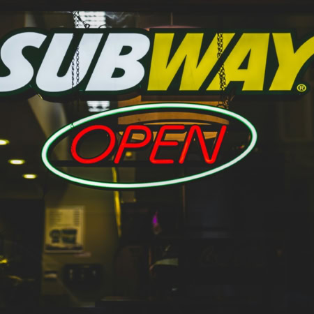 subway open sign in night window