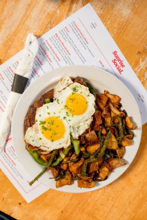 sunny side up eggs and potatoes breakfast plate
