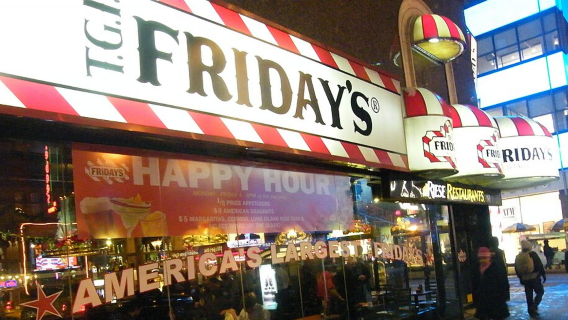 t.g.i. friday’s restaurant at night, neon exterior