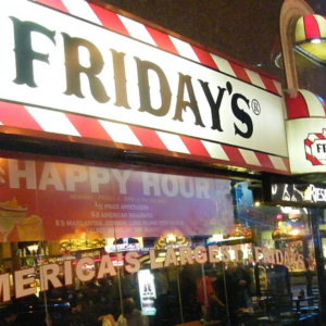 t.g.i. friday’s restaurant at night, neon exterior
