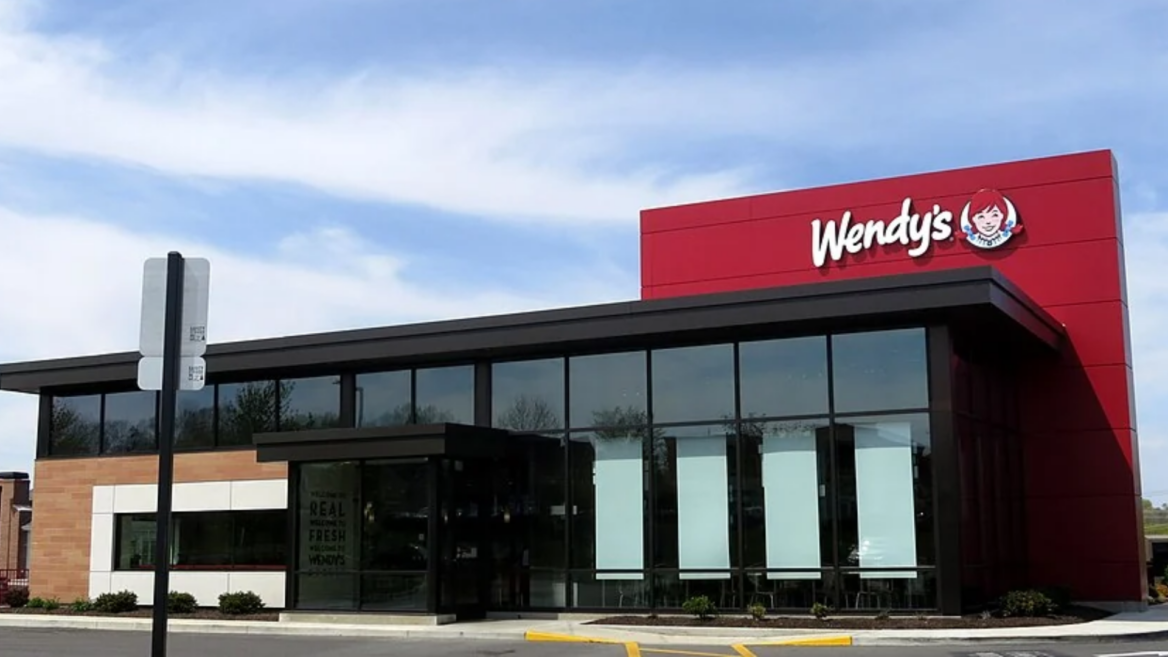 modern wendy’s restaurant exterior with glass facade
